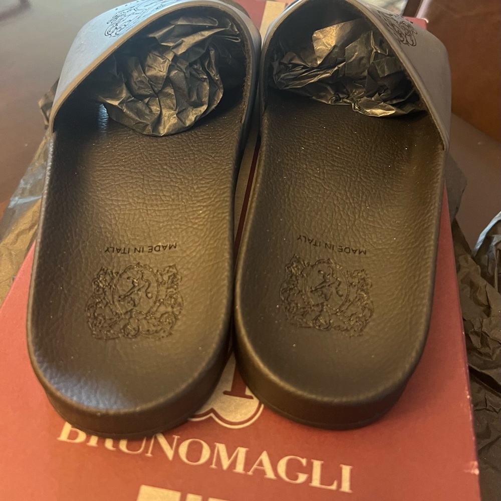 Bruno Magli Martino dark gray slide ons box has some minor scratches.